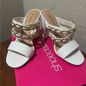 SOLD.....Women's white high heels size 7